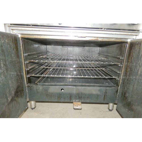 1021 - A commercial stainless steel gas fired 6 burner range by Cobra type CR9DF, LPG - trade