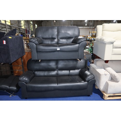 479 - 2 x black upholstered sofas. Please note that the two seater sofa has a tear in the upholstery (just... 