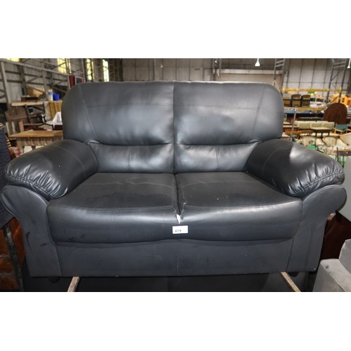 479 - 2 x black upholstered sofas. Please note that the two seater sofa has a tear in the upholstery (just... 