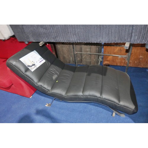 478 - An Edena black leather upholstered chaise longue RRP £689. Please note that one of the metal legs is... 