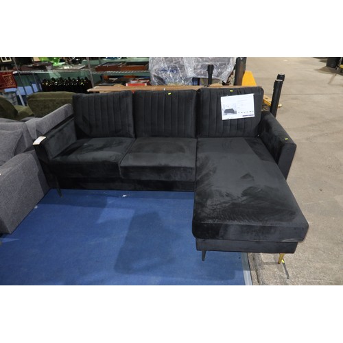 489 - A Christie black upholstered two part corner sofa chaise RRP £569