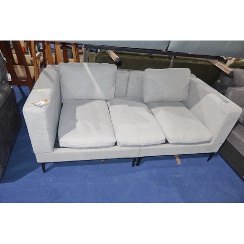 487 - A light upholstered two part sofa approx 165cm wide. Please note this sofa has three seat cushions a... 