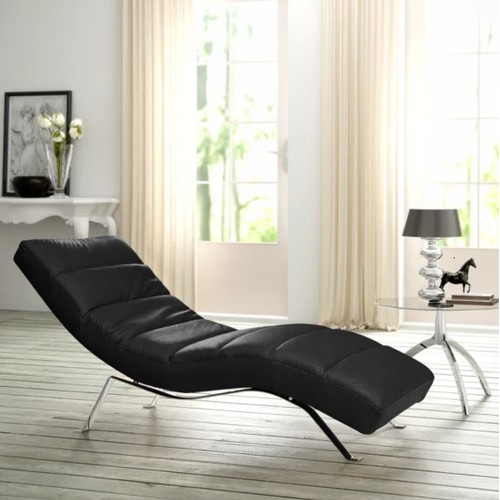 478 - An Edena black leather upholstered chaise longue RRP £689. Please note that one of the metal legs is... 