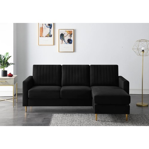 489 - A Christie black upholstered two part corner sofa chaise RRP £569