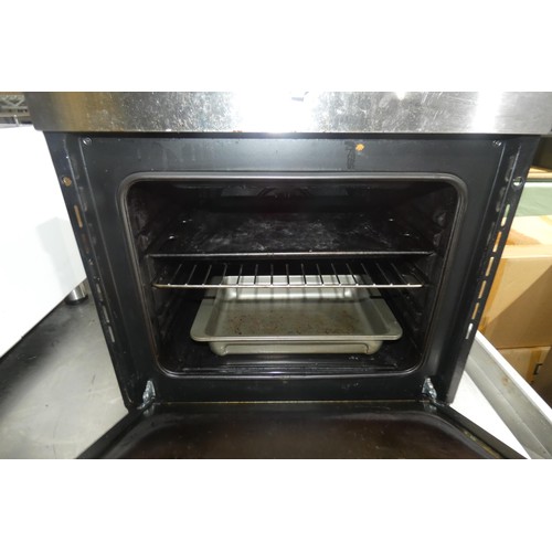 1109 - An electric integrated single door oven by Bush - trade. Tested Working