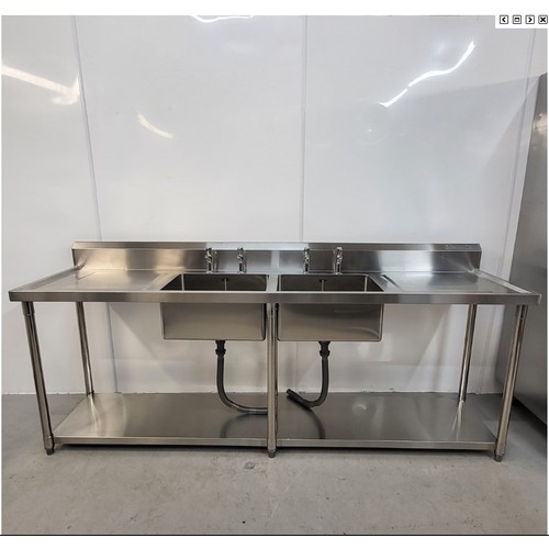 1113 - A boxed commercial stainless steel double sink unit approx 240x60x90cm