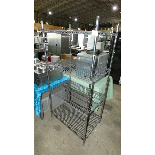 1063 - A catering type rack with 4 shelves approx 90x62x182cm