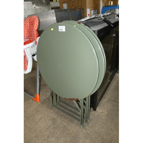 1089 - 3 x folding round cafe type tables approx 70cm in army green