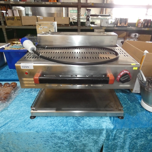 1099 - A commercial stainless steel counter top rise and fall salamander grill, no make or model visible - ... 