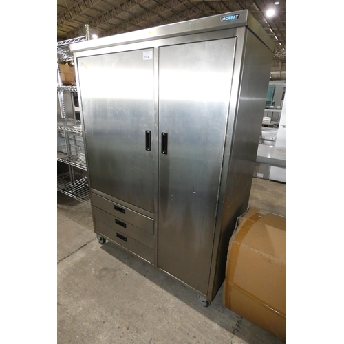 1114 - A commercial stainless steel mobile kitchen storage cupboard by Moffat with 2 doors and 3 drawers, a... 