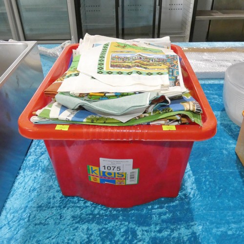 1075 - A crate containing a large quantity of themed tea towels