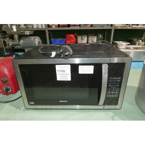 1106 - A black microwave oven by Kenwood - trade