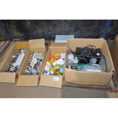 2004 - An Iwata Eclipse air brush with an Iwata compressor 240v and a quantity of various air brush paints,... 