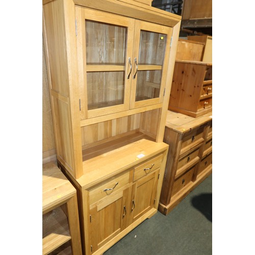 2119 - A light Oak two part sideboard /dresser with 2 x glass doors above and 2 drawers / 2 doors below app... 