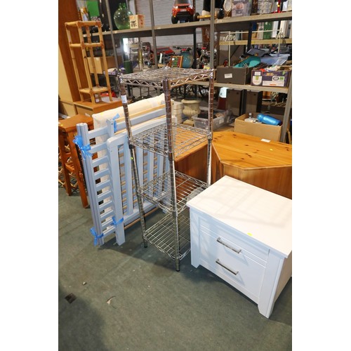 2124 - A child's cot with mattress (requires assembly), a metal shelf unit approx 35 x 35 x 120cm and 1 x w... 