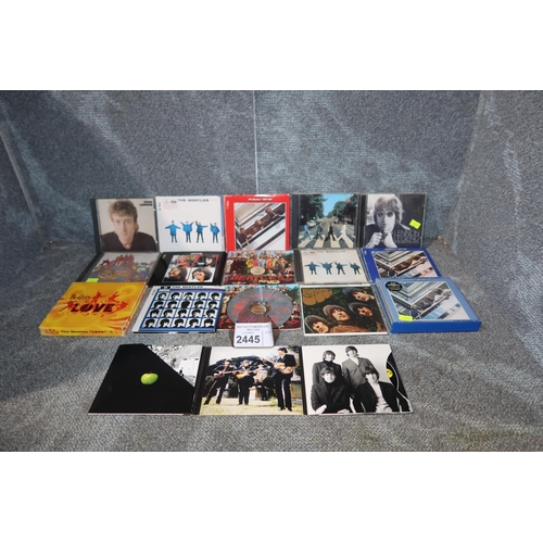 2445 - A quantity of various limited edition gate fold Beatles CDs, including Revolver, Rubber Soul, Hard D... 