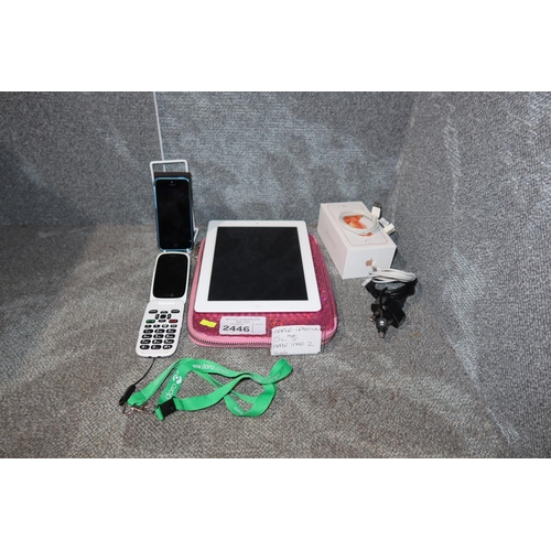 2446 - An apple iphone 5c and an iPad 2, plus a Dora mobile phone, (iPad will not reset, Dora will not char... 