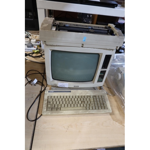 2526 - A vintage Amstrad 256k personal computer word processor with printer and green screen monitor PCW825... 