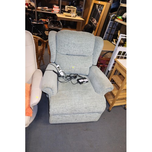 2152 - A Sherborne electrically operated reclining arm chair with a mains power supply and wired remote con... 