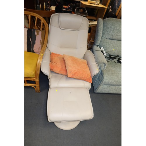 2151 - 1 x cream upholstered swivelling lounge chair, 1 x matching foot stool and 2 x orange scatter cushio... 