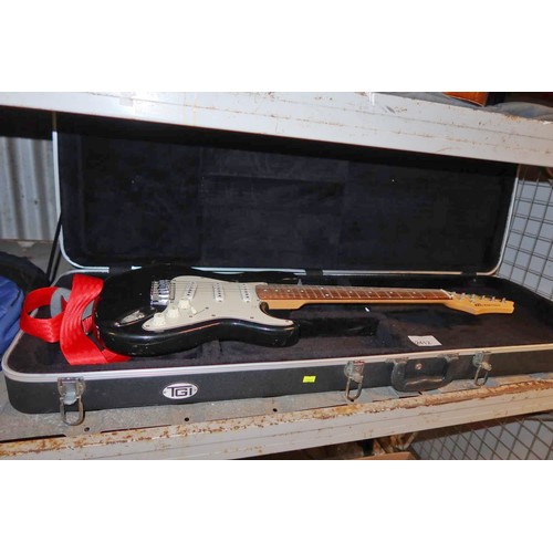 2412 - A electric guitar by Axl Player Deluxe with hard carry case