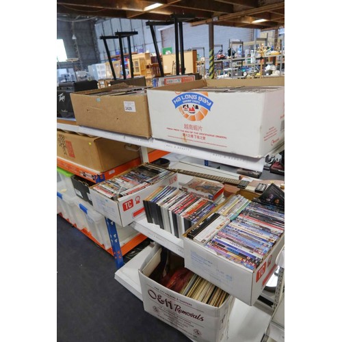 2429 - A large quantity of various DVDs and a quantity of records, contents of 5 boxes, 3 shelves