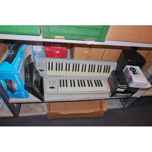 2437 - A quantity of various electronic related items including 2 x Roland midi controller keyboards, an Al... 