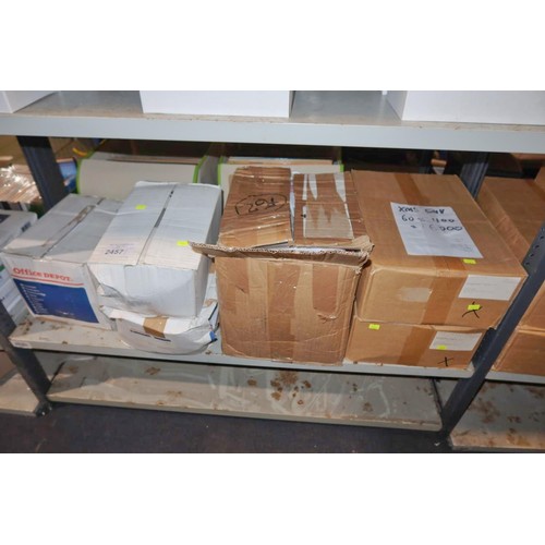 2457 - A quantity of various office related items including paper and envelopes, contents of 1 shelf