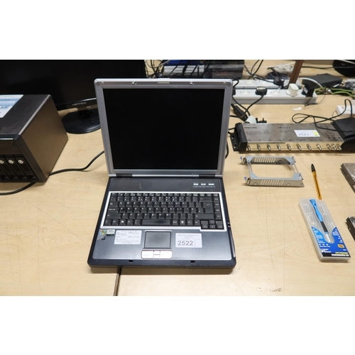 2522 - An old XP laptop by Tiny no HDD or operating system - trade