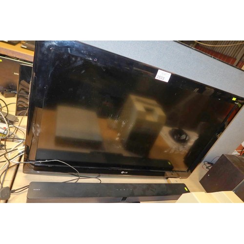 2533 - A 42 inch flat screen TV by LG type 42LG5020 with remote control but no stand & a Sony sound bar typ... 