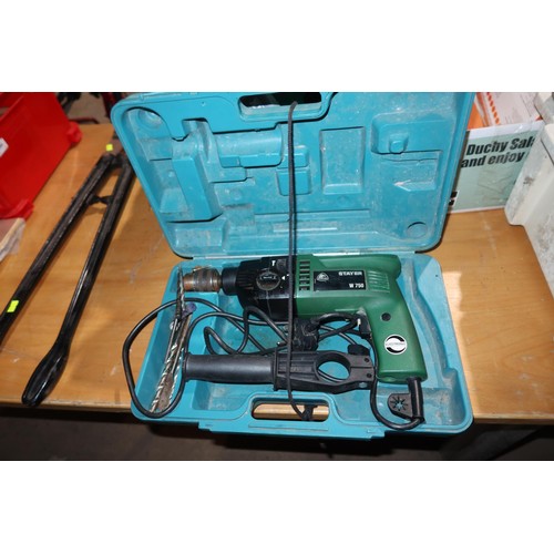 2020 - A quantity of various tools including a Stayer 240v drill, an angle grinder 240v, a hose on reel, a ... 