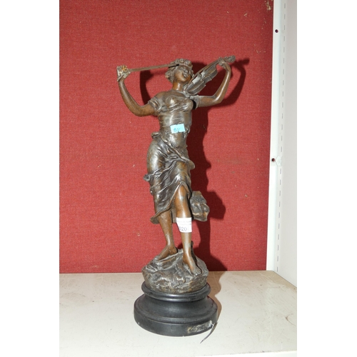 3020 - A bronze coloured spelter figure of a classical violinist