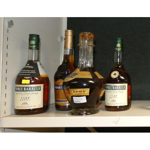 3059 - Four various bottles of brandy