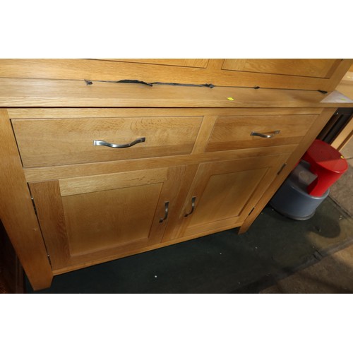 2115 - A light Oak two part sideboard / dresser with 2 glass doors above and 2 drawers / 2 doors below appr... 