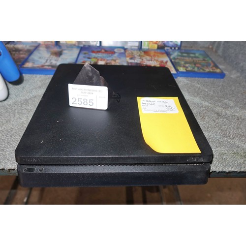 2585 - A Sony PlayStation 4 slim console with an upgraded 2tb Solid state drive (factory reset), 9 games in... 