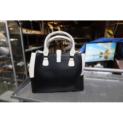 2208 - 1 x Nicole and Doris black / white handbag