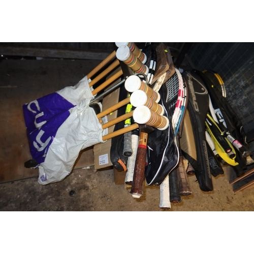 2162 - A quantity of various sports racquets and a croquet set