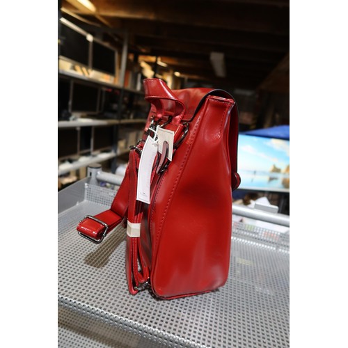 2218 - 1 x Nicole and Doris burgundy hand bag / back pack