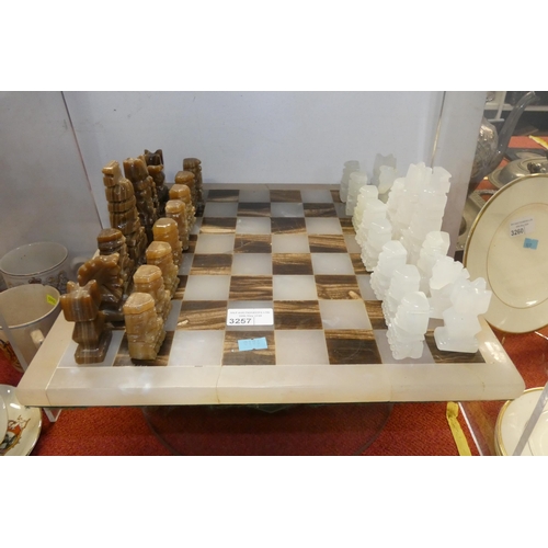 3257 - A vintage brown and white onyx chess set and board