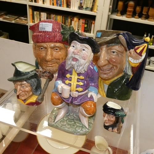 3259 - 4 Royal Doulton character jugs; the lumberjack, the Punch and Judy man, Pied Piper small, Scaramouch... 