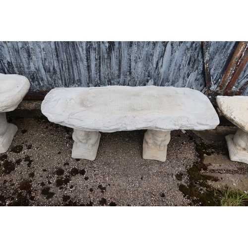 2688 - A wood effect concrete bench on 2 squirrel plinths