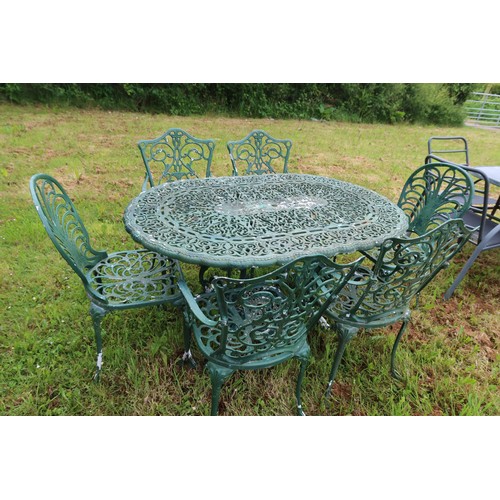 2693 - A metal garden dining set comprising of a table & 6 chairs in green