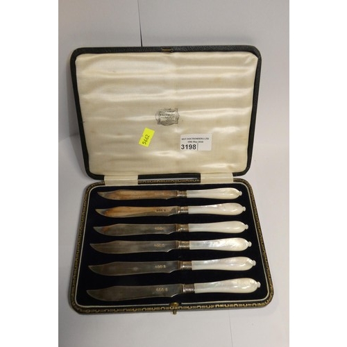 A boxed set of six silver fruit knives with mother of pearl handles, Sheffield 1926