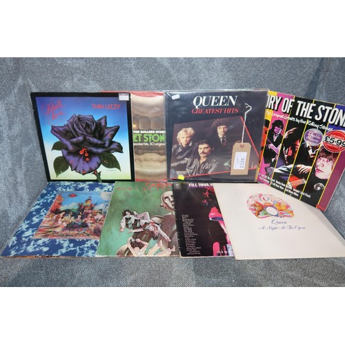 2328 - 3 x LPs by Queen, 3 x by the rolling stones, 1 by thin Lizzy and a rock compilation