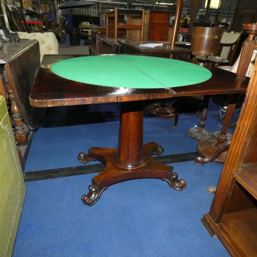 A Victorian rosewood rectangular top fold over card table enclosing a ...
