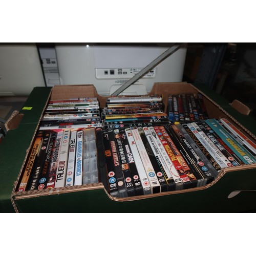 2440 - A quantity of various DVDs, contents of 3 shelves