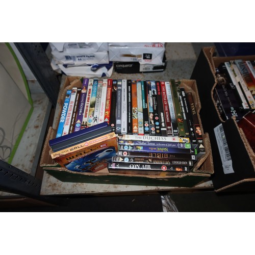 2440 - A quantity of various DVDs, contents of 3 shelves