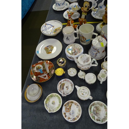 A quantity of various items including figures of Mickey and Minnie ...