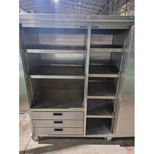 1114 - A commercial stainless steel mobile kitchen storage cupboard by Moffat with 2 doors and 3 drawers, a... 