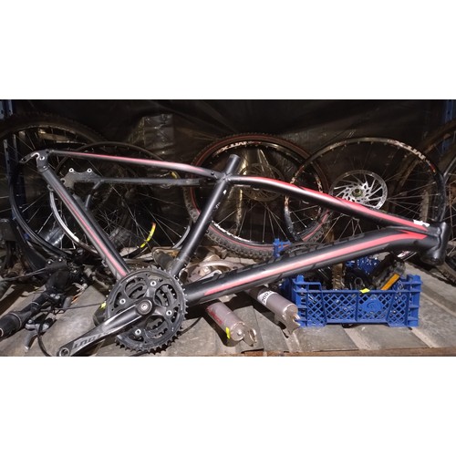 2003 - A quantity of various mountain bike parts including a specialized rock hopper frame. Forks, seats, S... 